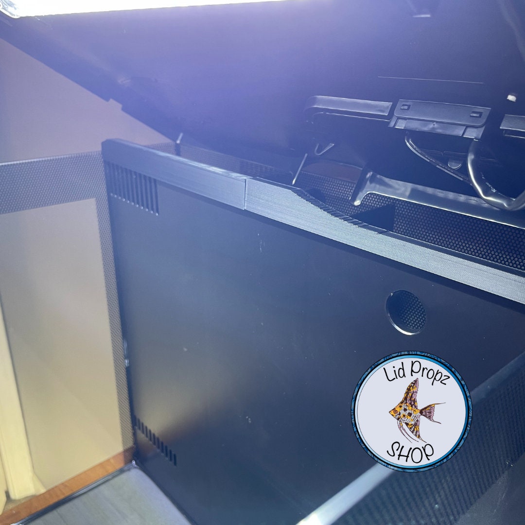 Close-up of rear chamber guard with lid props and intake covers in place. Provides full protection against fish escaping into the rear filter compartment.