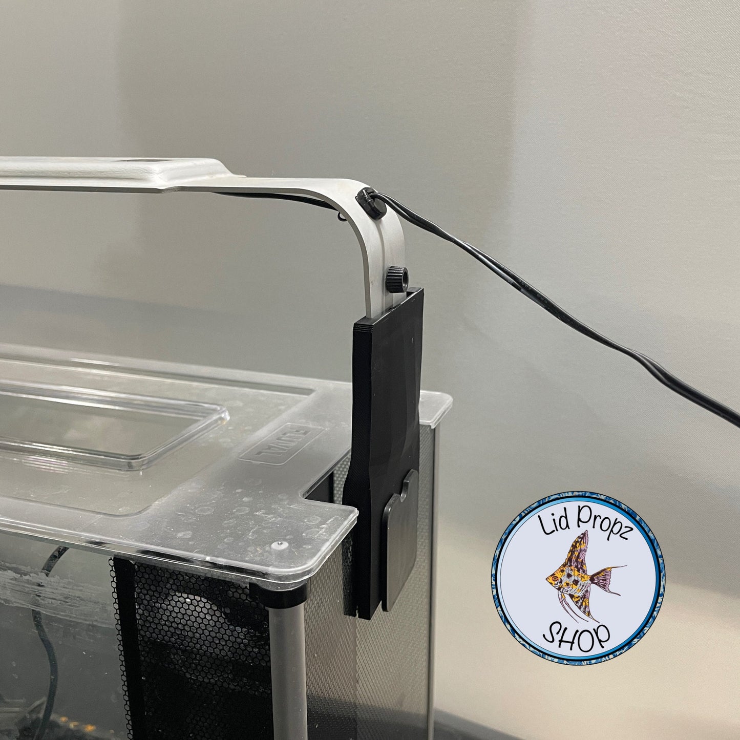 Light Riser For Fluval Spec V light. Raised light 3 + inches