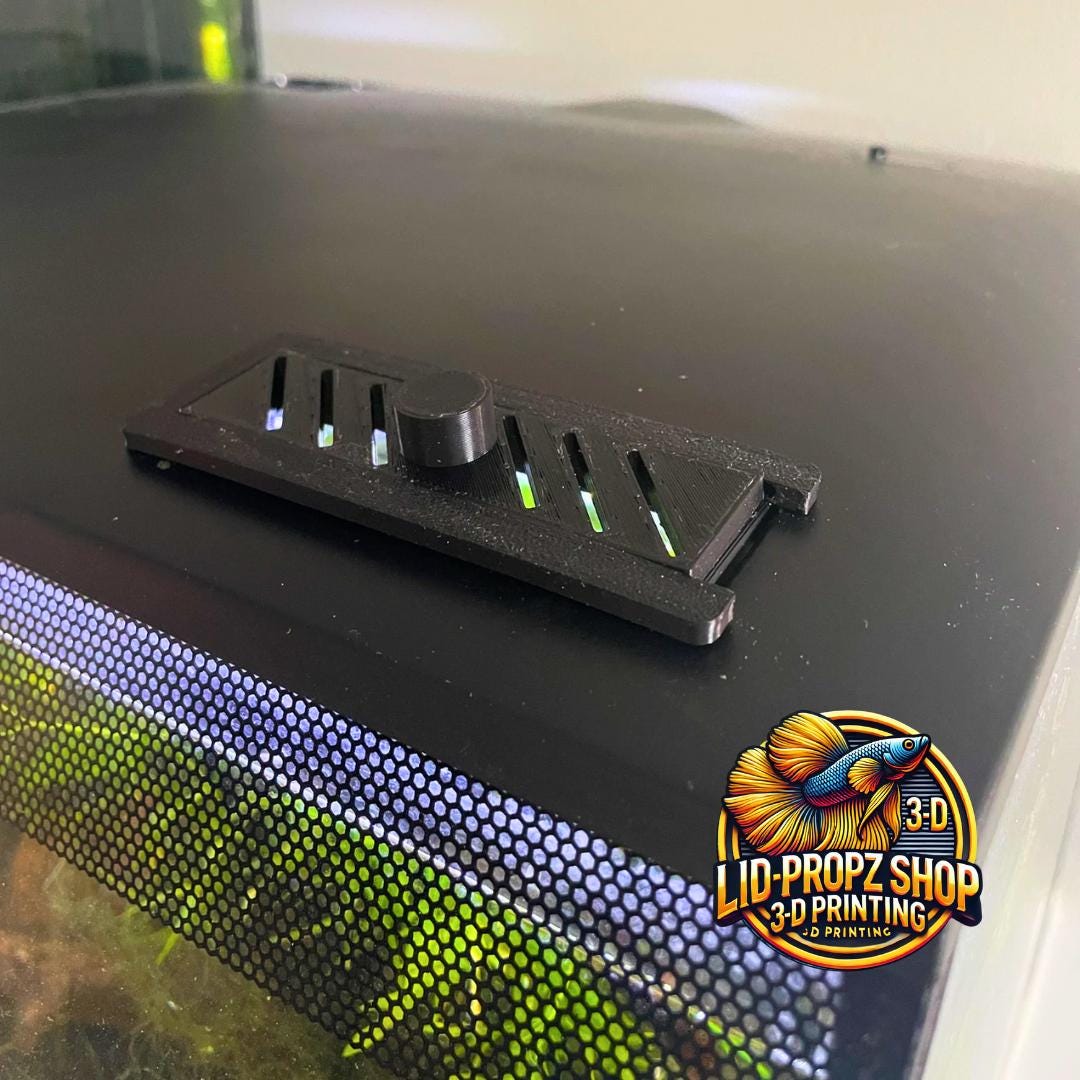 All-in-one Fluval Flex tank upgrade kit including spray bar for gentle flow, lid props for ventilation, intake covers to protect shrimp, and black or white sliding feed cover. Custom-fit for 9G and 15G models.